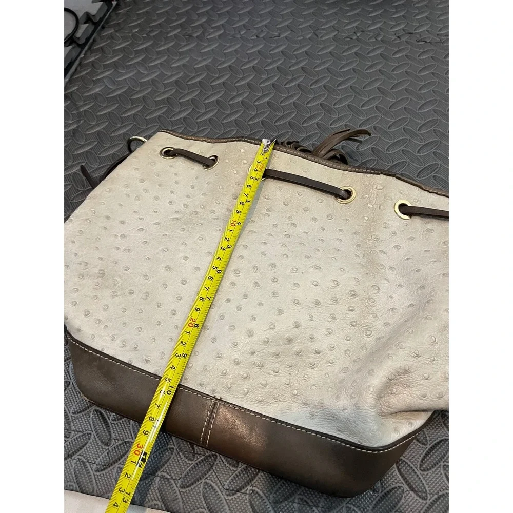 Dooney & Bourke Bucket Bag Womens Medium Cream Brown Ostrich Embossed Tassel